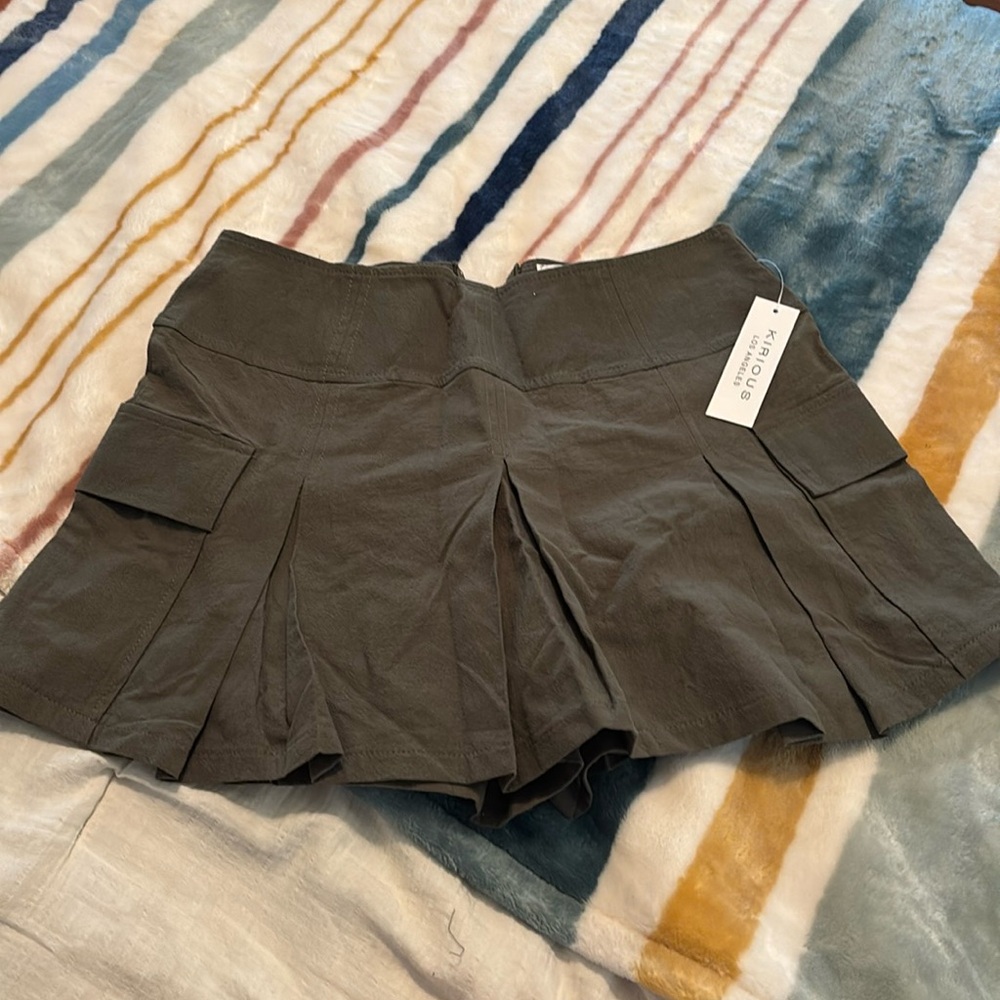 Army green skirt with shorts under